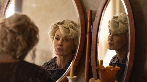 Эд Харрис и Джессика Лэнг на постере драмы «Долгий день уходит в ночь»